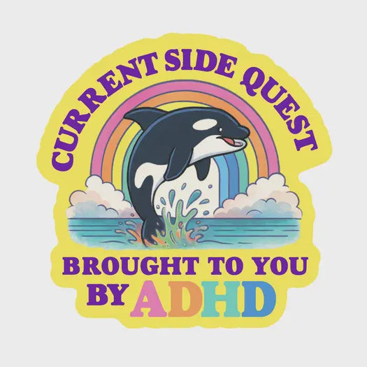 Sticker with an orca whale, rainbow, and text 'Current Side Quest Brought to You by ADHD' on a white background.